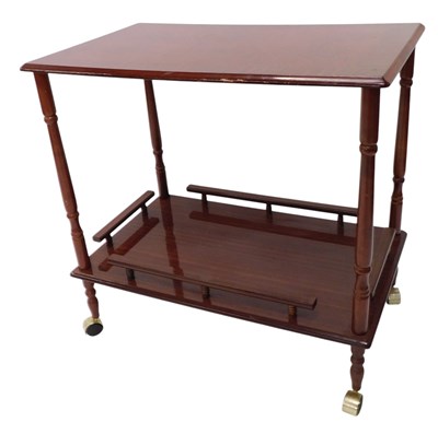 Lot 1521 - A late 20thC mahogany two tier trolley, on...