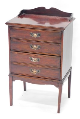 Lot 1530 - An Edwardian mahogany music cabinet, with four...