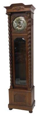 Lot 1086 - An early 20thC longcase clock, the silvered...