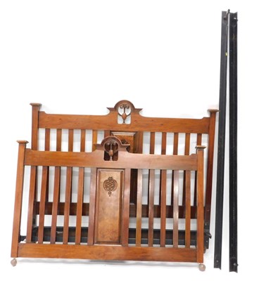 Lot 1110 - A late Victorian walnut and figured walnut bed...