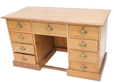 Lot 1543 - A late 19th/early 20thC pitch pine kneehole...