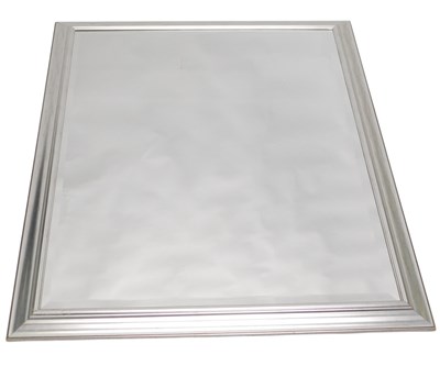 Lot 1548 - A modern silvered wooden wall mirror, with a...