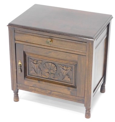 Lot 1553 - A stained beech side cabinet, the rectangular...