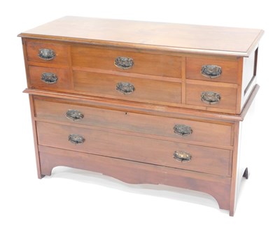 Lot 1109 - A walnut chest of drawers, the top with a...