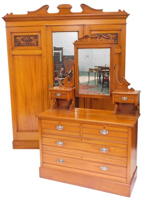 Lot 899 - A late Victorian pale walnut triple wardrobe,...