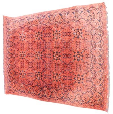 Lot 1579 - A Turkoman style carpet, decorated overall...