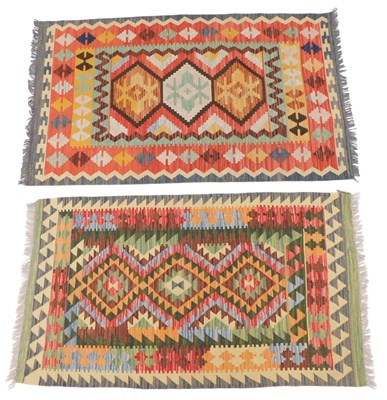 Lot 1583 - Two similar Kilim flat weave rugs, each...