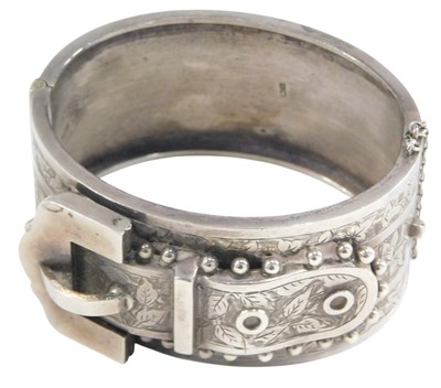Lot 464 - An early 20thC silver belt and buckle bangle,...