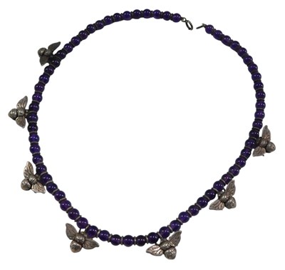 Lot 465 - An amethyst bead necklace, set with silver...
