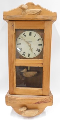Lot 3166 - A pine cased wall clock, with Roman numeral...