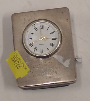 Lot 3184 - A silver desk clock, with circular Roman...