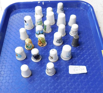 Lot 2017A - A collection of thimbles, mostly ceramic.