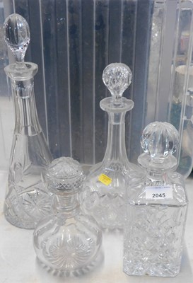 Lot 2045 - Four cut glass decanters with stoppers, the...