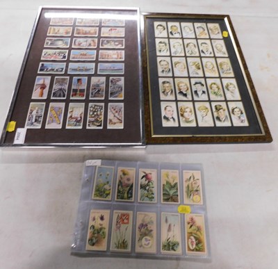 Lot 2064 - Cigarette cards, two framed and glazed...