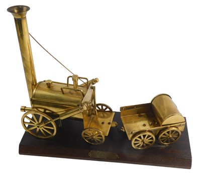 Lot 1126 - A brass model of Stephenson's Rocket, on...