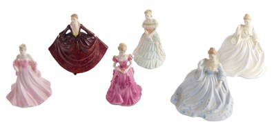 Lot 1133 - A collection of six porcelain figurines,...