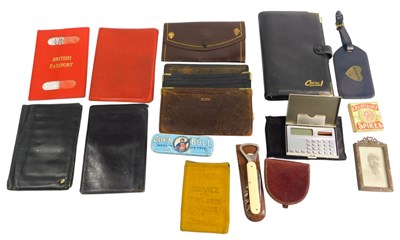 Lot 1414 - A quantity of leather wallets, passport case,...