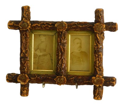 Lot 1419 - A Victorian trampware wooden photograph frame,...