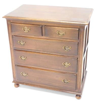 Lot 1558 - A Reprodux oak chest, of two short and three...