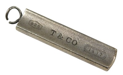 Lot 474A - A Tiffany and Co silver bar pendant, number...
