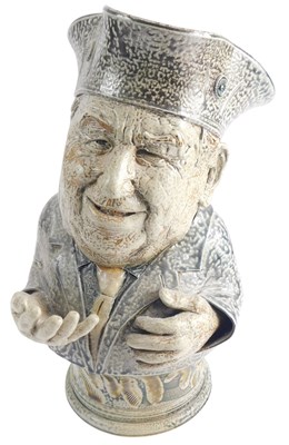 Lot 572 - A large salt glazed toby jug, modelled in the...