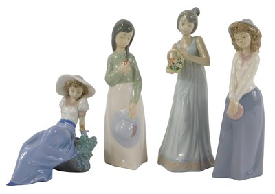 Lot 472 - Four Nao porcelain figures, modelled as a lady...
