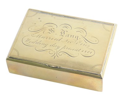 Lot 826 - A Victorian brass snuff box, engraved to the...