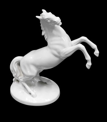 Lot 841 - A German white glazed porcelain model of a...