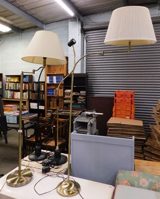 Lot 2601 - Two brushed brass standard lamps, and two others.