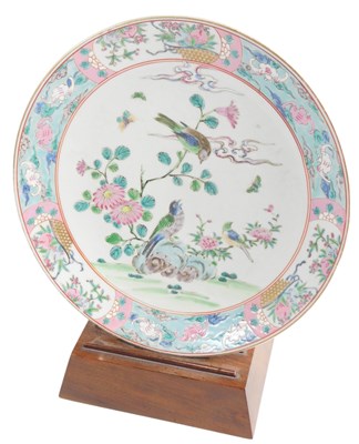 Lot 809 - An Oriental porcelain plate, decorated with...