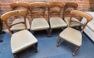 Lot 1037 - A set of six Victorian balloon back walnut...