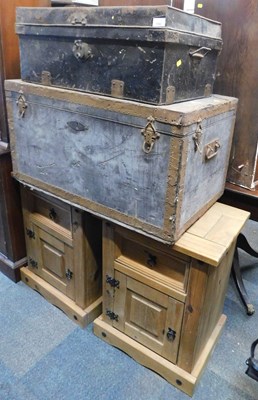 Lot 1042 - Two tin trunks, and two pine bedside cupboards...