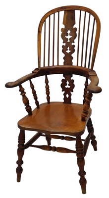 Lot 848 - A mid 19thC yew high back Windsor chair, with...