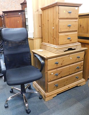 Lot 1051 - A pine chest of three drawers, raised on...