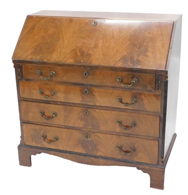 Lot 852 - A George III mahogany bureau, the fall...