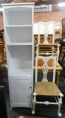 Lot 1057 - A white-painted hall cupboard, of three...