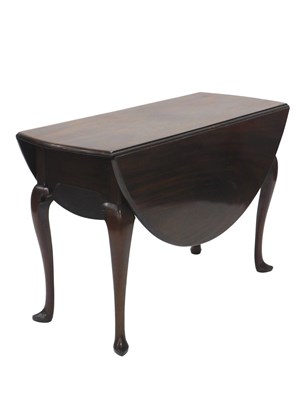 Lot 1155 - An 18thC mahogany oval drop leaf table, on...