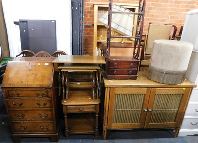 Lot 1073 - A four-tier bookshelf or occasional unit, with...