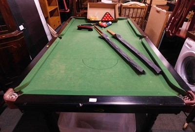Lot 1074 - A pool table or half sized snooker table, with...