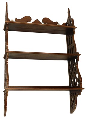 Lot 869 - A mahogany wall cupboard, in Chippendale style,...