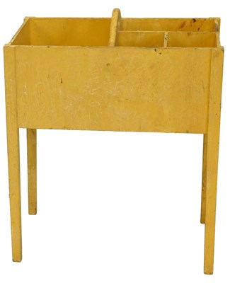 Lot 1108 - A yellow painted cutlery and bottle stand,...