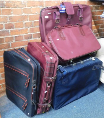 Lot 1026 - Various material suitcases, holdalls, etc. (a...