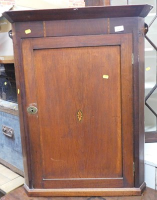 Lot 1047 - A George III oak and mahogany hanging corner...