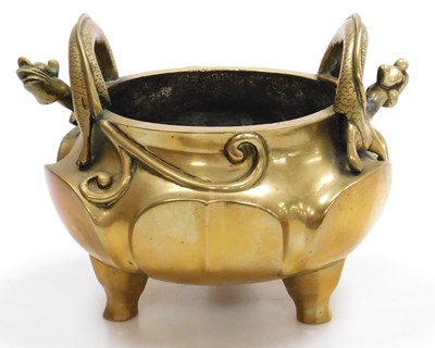 Lot 5 - A Chinese bronze censer, of lotus flower form,...
