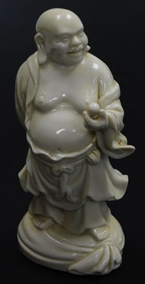 Lot 27 - A Chinese blanc-de-chine porcelain figure of...