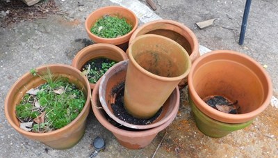 Lot 401 - A quantity of terracotta garden pots, various...