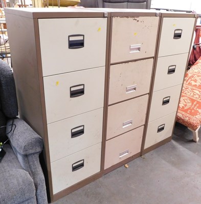 Lot 2607 - A pair of two tone metal four drawer filing...