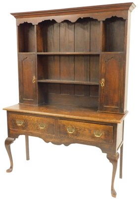 Lot 38 - An 18thC and later oak dresser, the top with a...