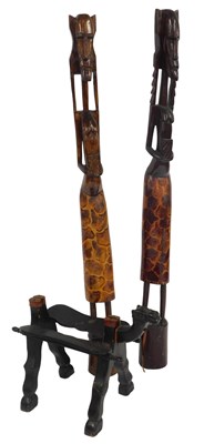 Lot 531 - A pair of hardwood tribal figures, modelled as...