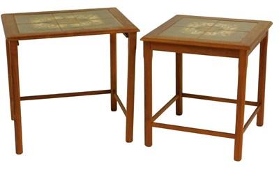 Lot 540 - A 1970s nest of two teak tables, each with a...